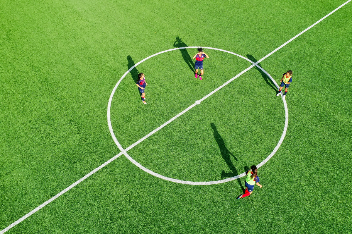 Female Players Playing Soccer